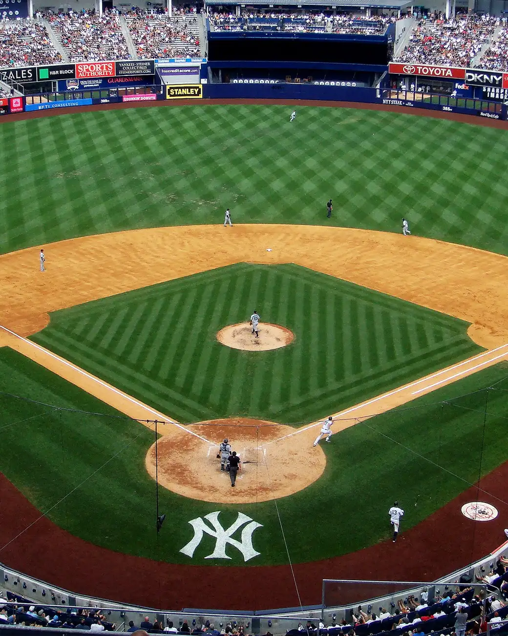 A Major League ballpark seen from the upper deck, the infield laid out below