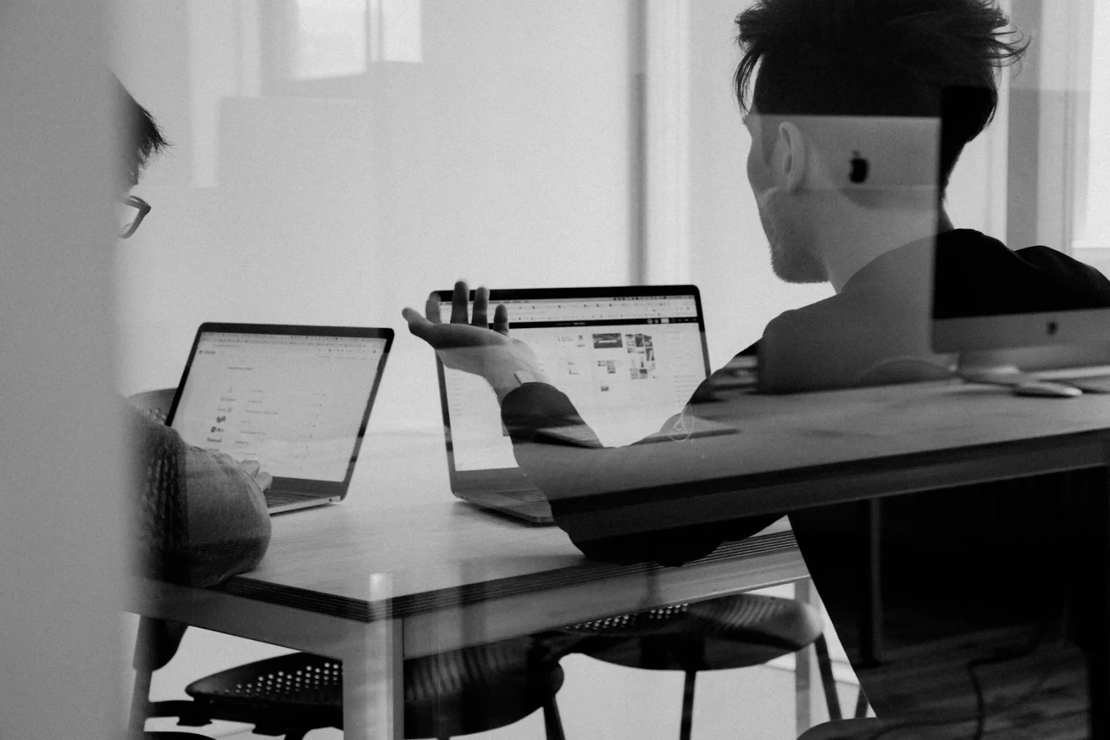 Advisors reviewing a mandate together